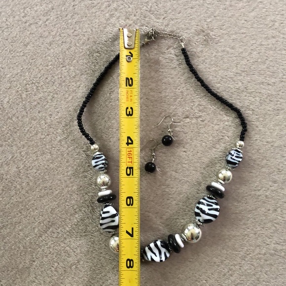 Zebra beaded necklace with matching earrings. - Picture 6 of 6